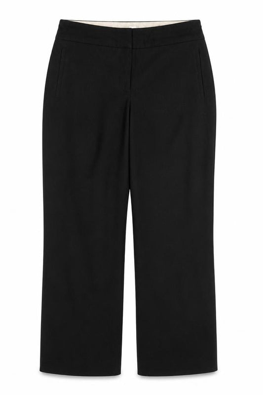 Front view of Next women’s black polyester trousers, size UK 10, 28-inch leg regular zip
