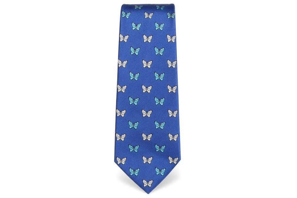 Front view of The Stroke men’s pink geometric silk pointed tie one size