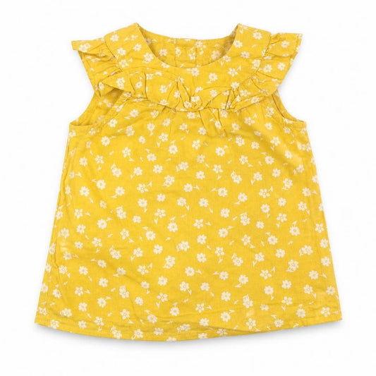 Front view of Primark girls’ yellow floral 100% cotton a-line, size 6-9, months round neck button
