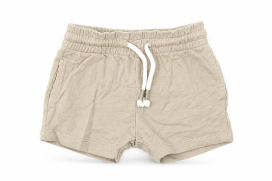 Front view of Next Baby Beige Cotton Cropped Trousers, size 6-9, Months Drawstring