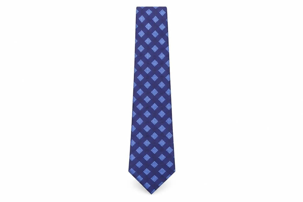 Front view of Simon Taylor men’s blue geometric polyester pointed tie one size