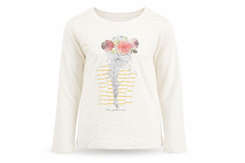 Front view of Dunnes girls’ white spotted 100% cotton pullover t-shirt, size 5, years round neck pullover