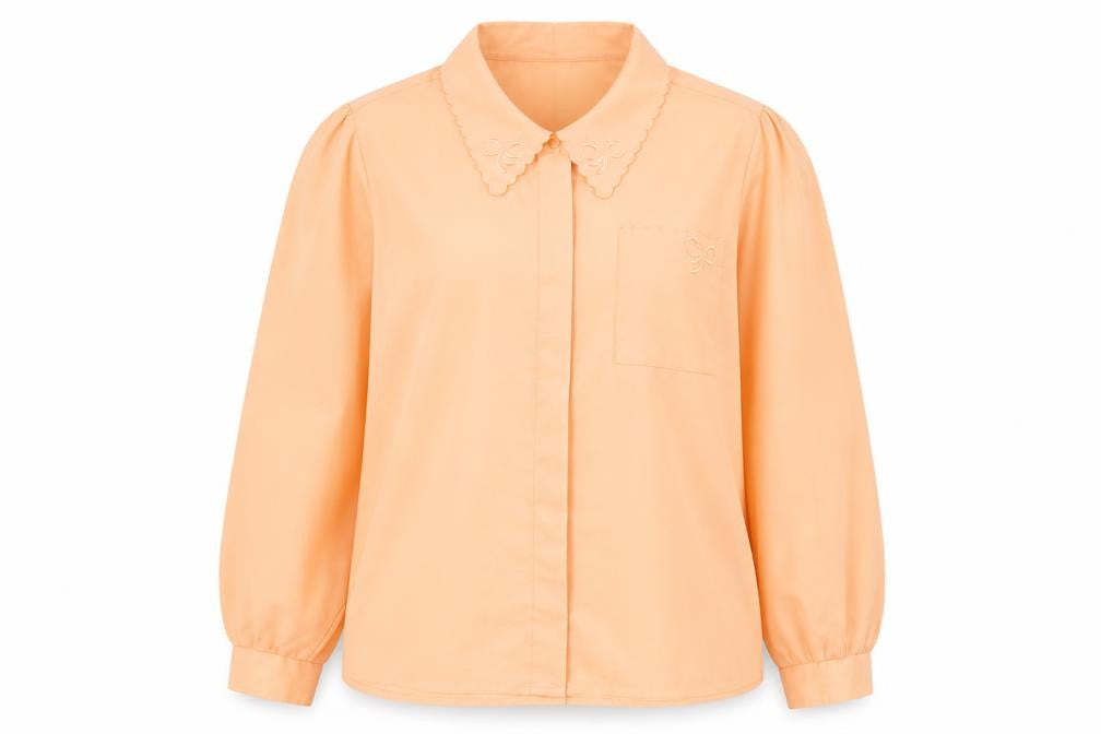 Front view of Littlewoods women’s orange polyester basic button-up, size UK 18, collared