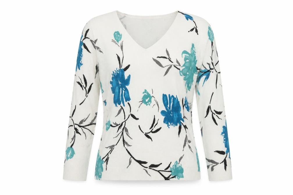 Front view of M&Co women’s white v-neck floral acrylic jumper, size S