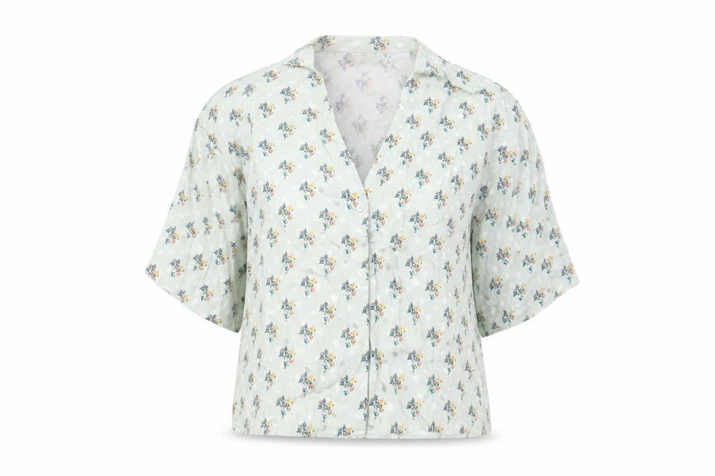 Front view of Topshop women’s green floral viscose basic button-up, size UK 10, v-neck