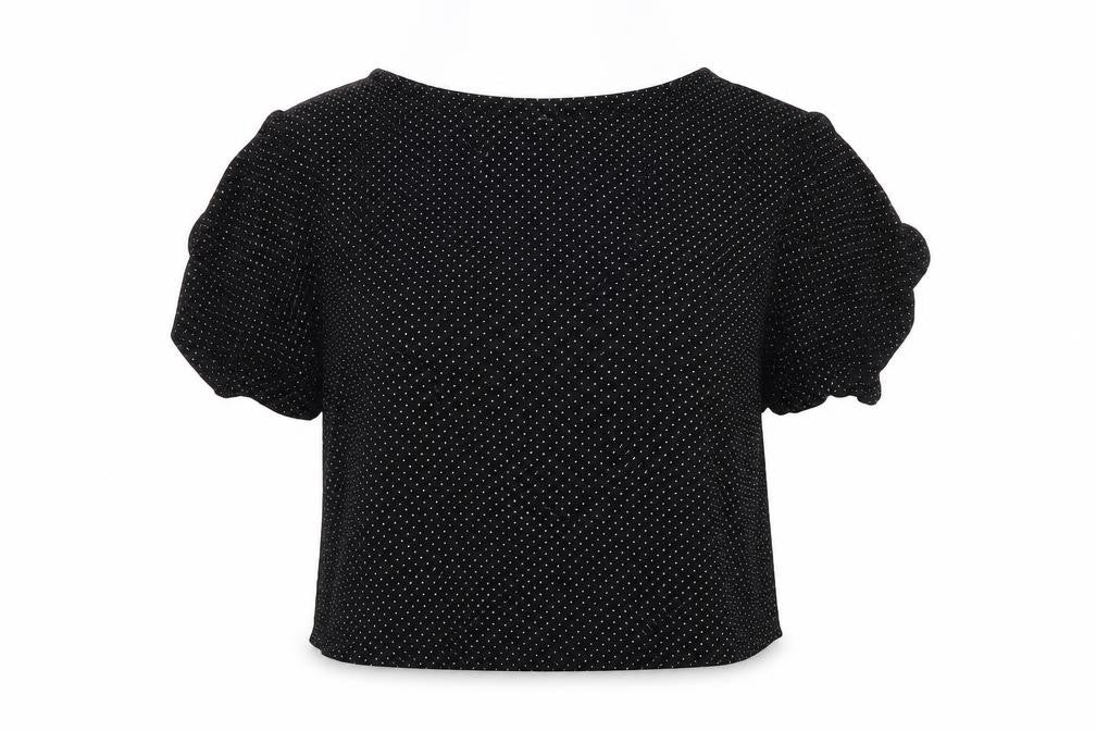 Front view of H&M women’s black polka dot viscose basic blouse, size UK 10, round neck