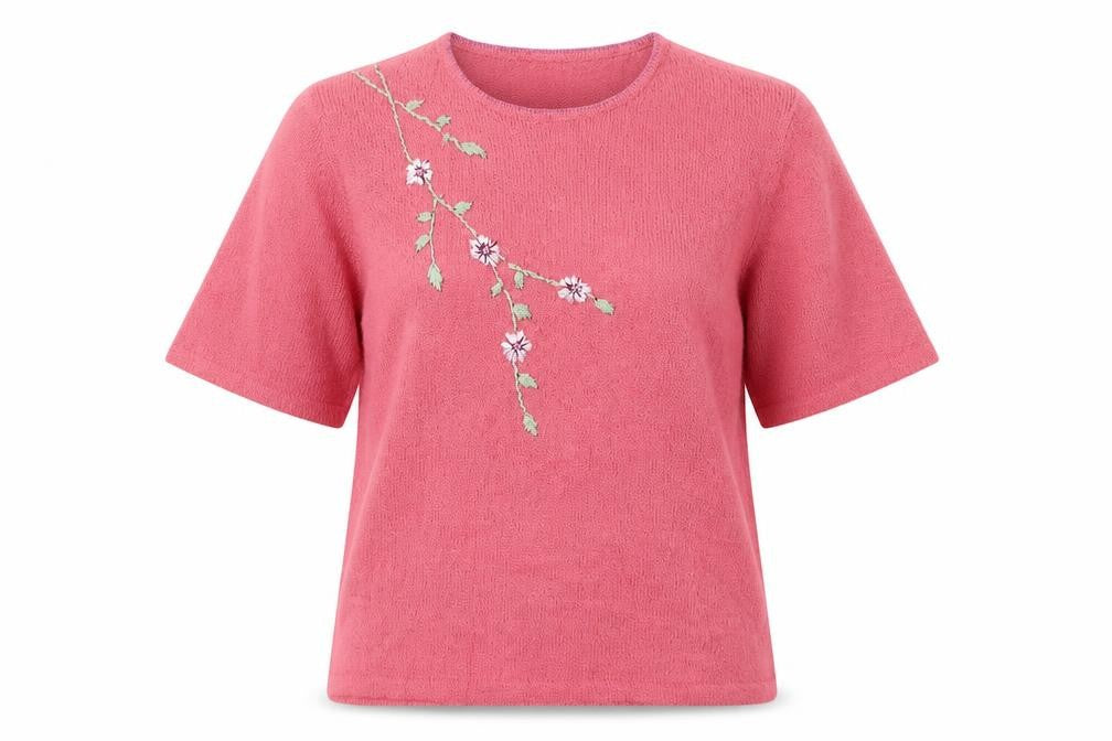 Front view of EWM women’s pink round neck floral acrylic jumper, size UK 14