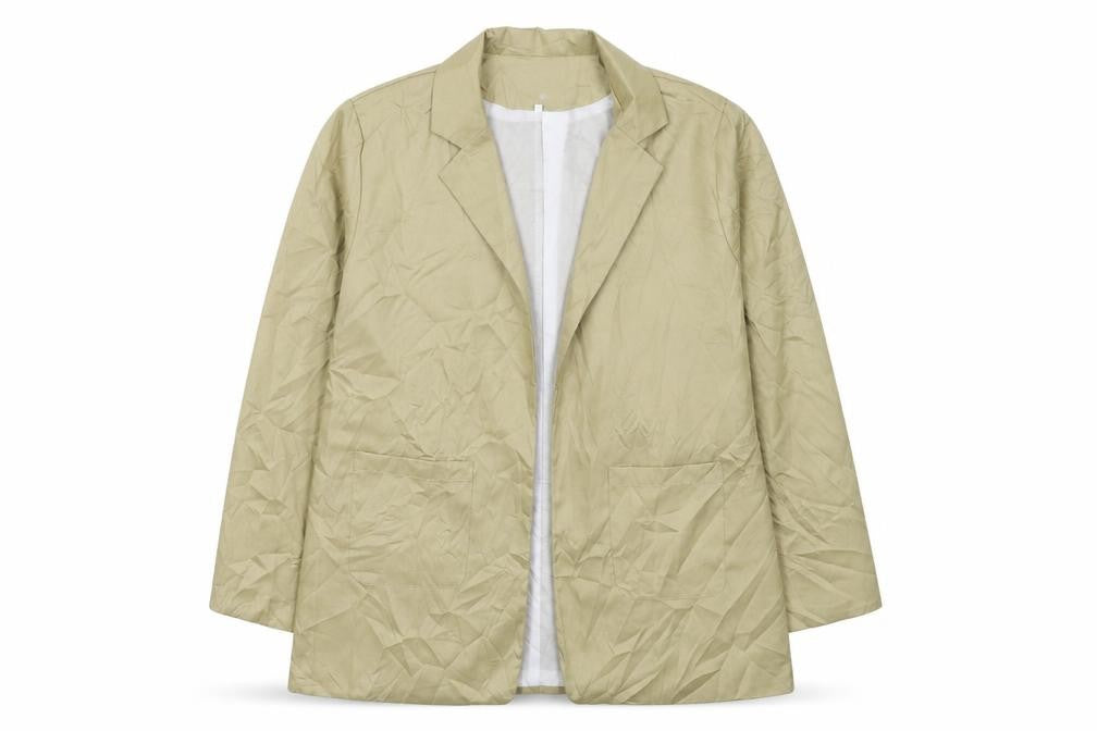 Front view of Preworn women’s beige jacket, size 4XL