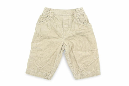 Front view of Marks & Spencer Baby Beige Cotton Capri Trousers, size 3-6, Months
