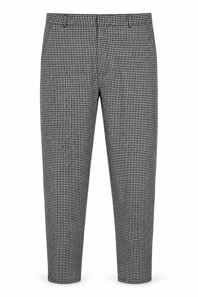 Front view of boohooMAN men’s multicoloured check polyester trousers, size M, 29-inch leg regular button