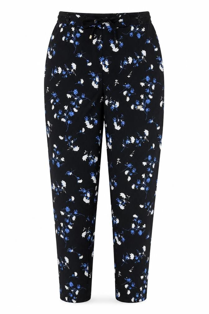 Front view of Dunnes women’s multicoloured floral polyester trousers, size S, 27-inch leg regular drawstring