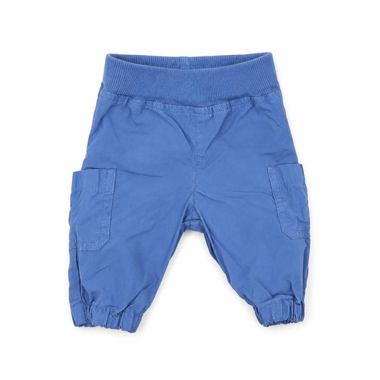 Front view of United Colors of Benetton boys’ blue cotton track pants trousers, size 0-3, months pullover
