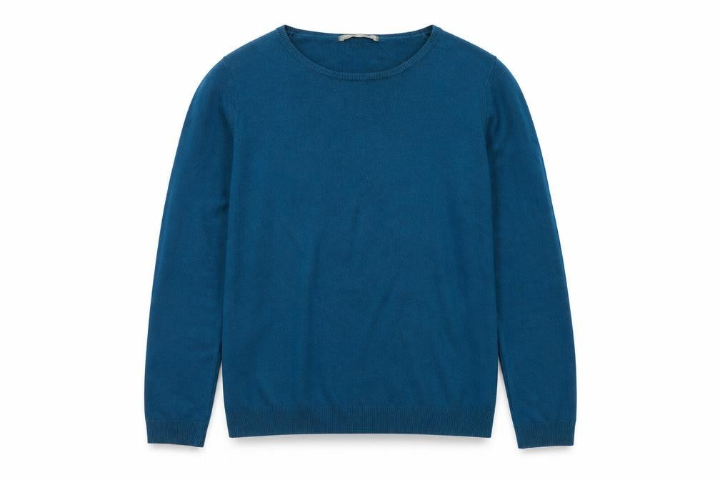 Front view of Marks & Spencer women’s blue crew neck acrylic jumper, size UK 12