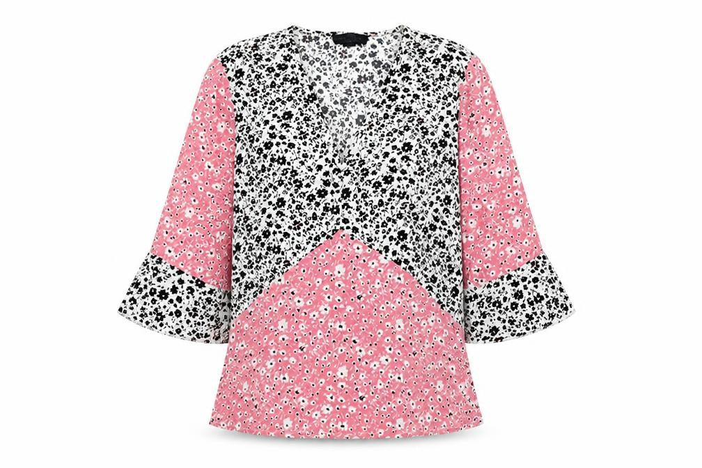 Front view of Wednesday's Girl women’s pink floral polyester basic blouse, size S, v-neck