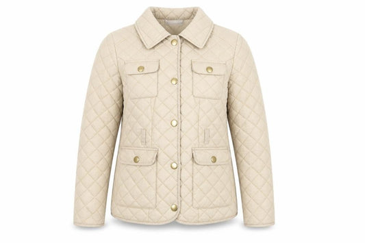Front view of Vintage Boutique women’s beige quilted jacket, size UK 12, snap