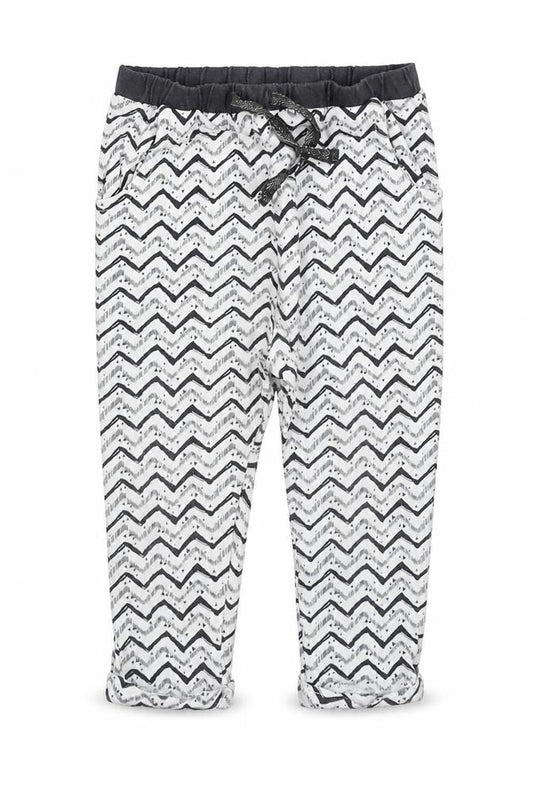 Front view of Next girls’ ivory geometric cotton jogger trousers, size 9-12, months pullover