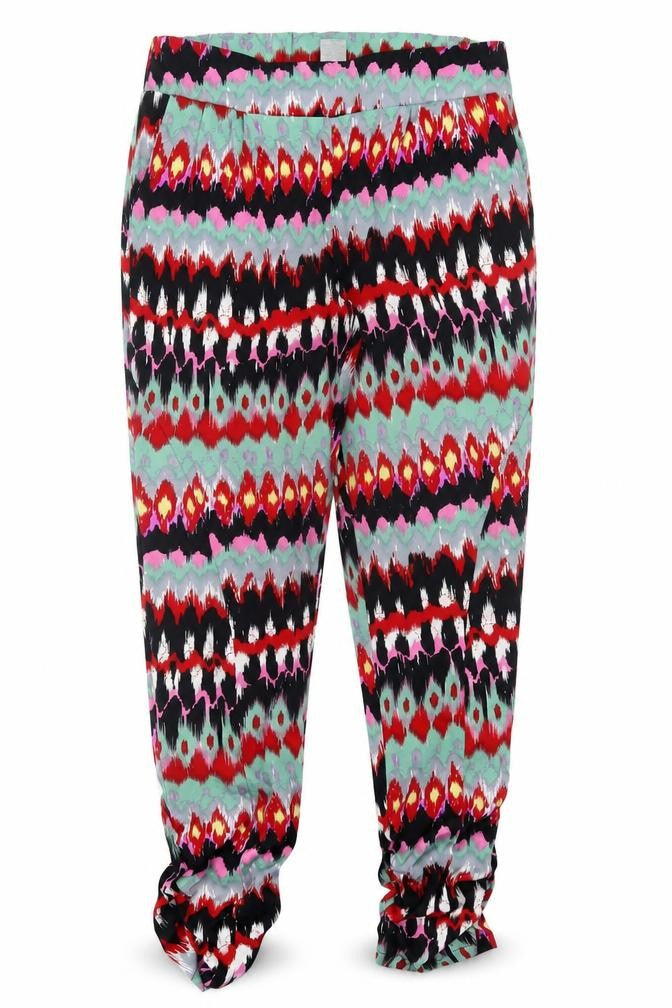 Front view of dizzylizzy women’s multicoloured geometric polyester trousers, size M, 29-inch leg regular