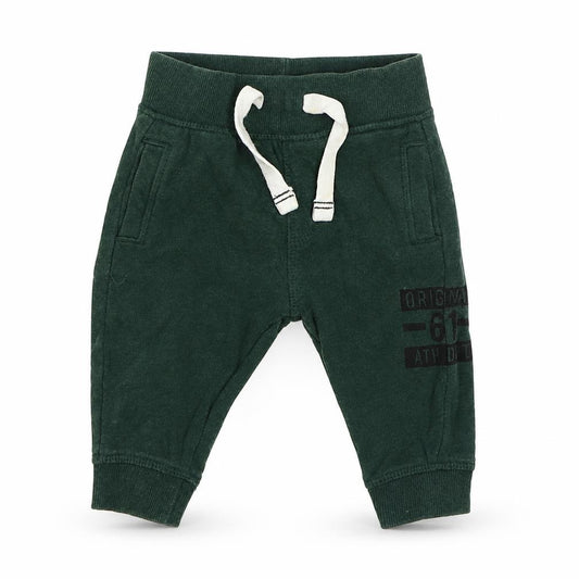 Front view of Mothercare boys’ green cotton jogger trousers, size 6-9, months