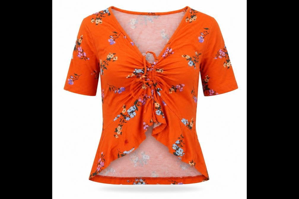 Front view of Primark women’s orange floral polyester basic t-shirt, size UK 8, v-neck