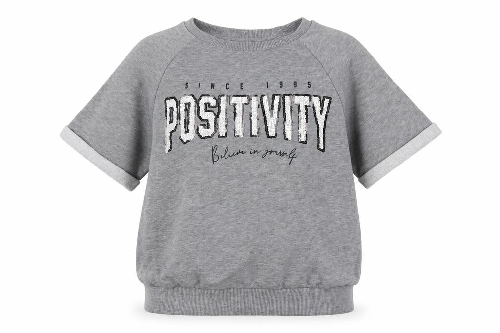 Front view of Tu girls’ grey polyester pullover sweatshirt, size 11, years