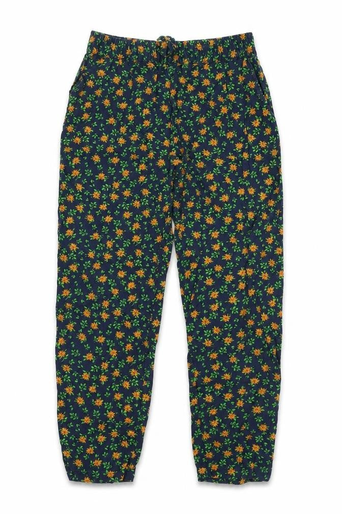 Front view of Next girls’ multicoloured floral viscose jogger trousers, size 9, months slim drawstring
