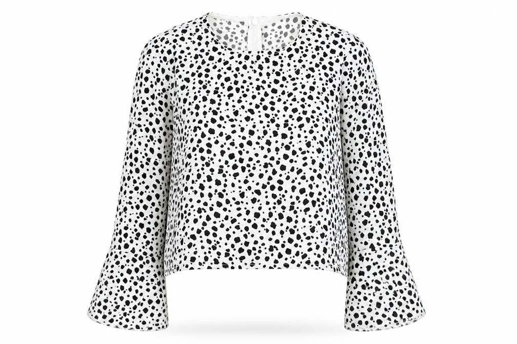 Front view of PRETTYLITTLETHING women’s white polka dot polyester basic blouse, size UK 10, round neck