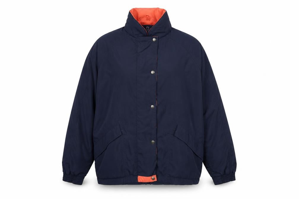 Front view of Proquip women’s blue windbreaker jacket, size UK 18, zip
