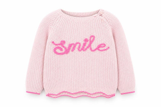 Front view of Primark girls’ pink cotton jumper, size 24, months