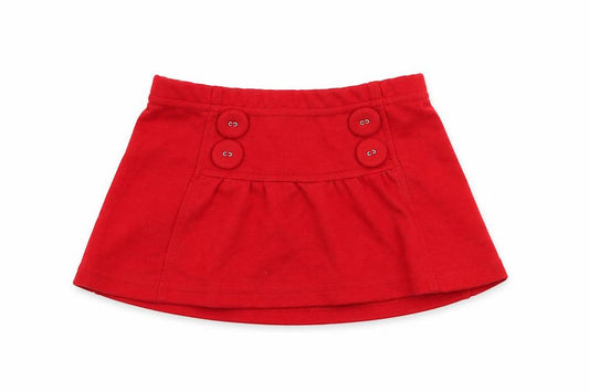 Front view of United Colors of Benetton girls’ red polyester skater skirt, size 18, months pull on