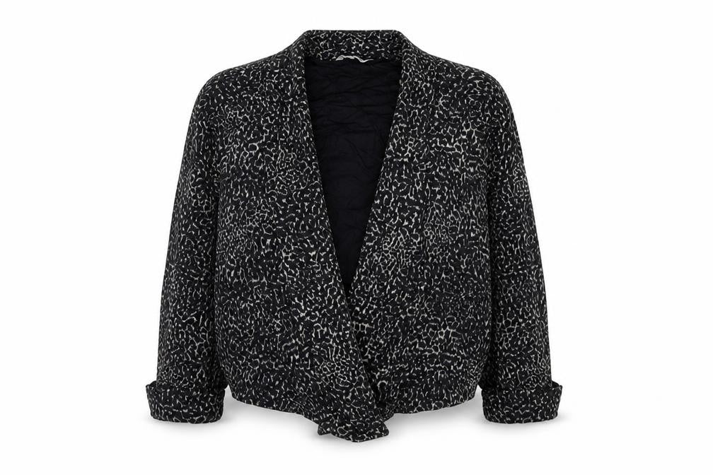 Front view of Marks & Spencer women’s black animal print viscose basic blouse, size UK 8, v-neck