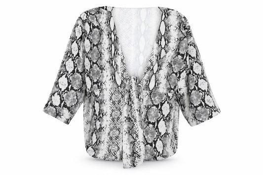 Front view of PRETTYLITTLETHING women’s white animal print polyester basic blouse, size UK 14, v-neck