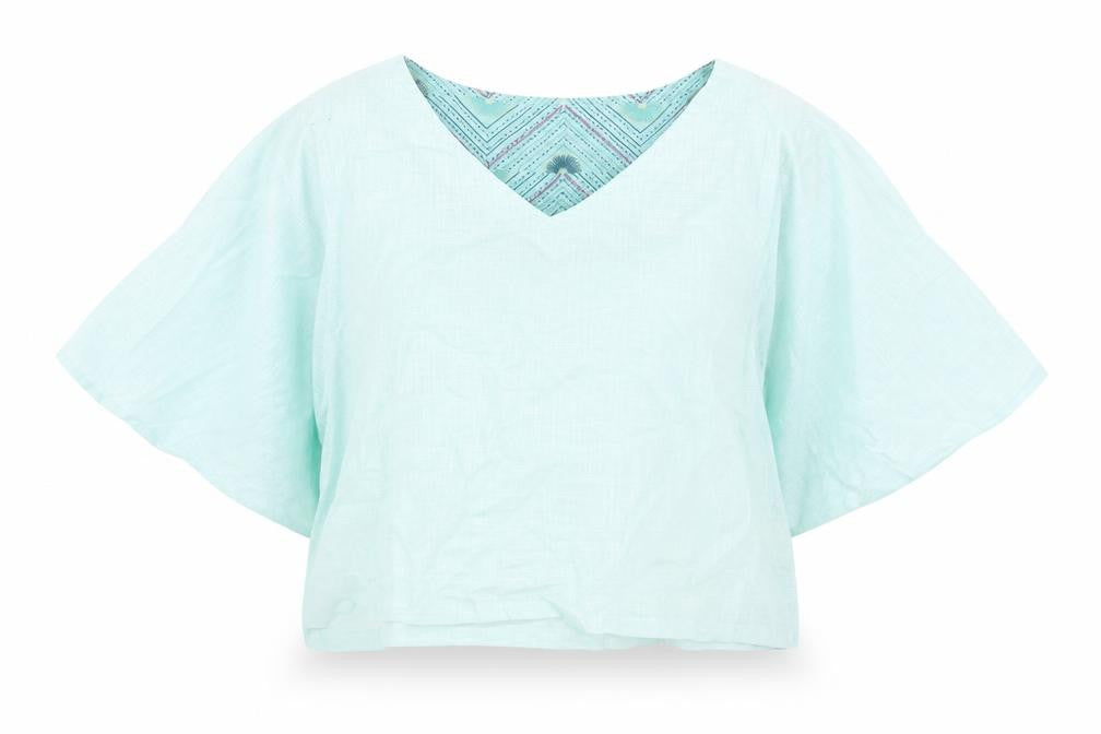 Front view of Fab women’s green cotton cropped blouse, size M, v-neck
