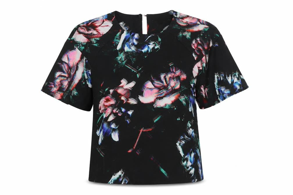 Front view of Warehouse women’s multicoloured floral polyester basic blouse, size UK 10, round neck