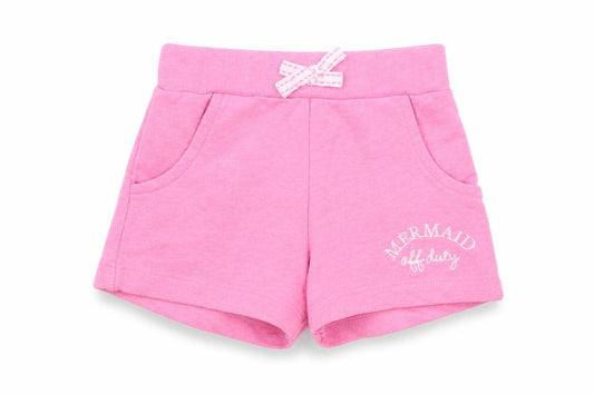 Front view of Dunnes girls’ pink polyester cropped trousers, size 18-24, months tie