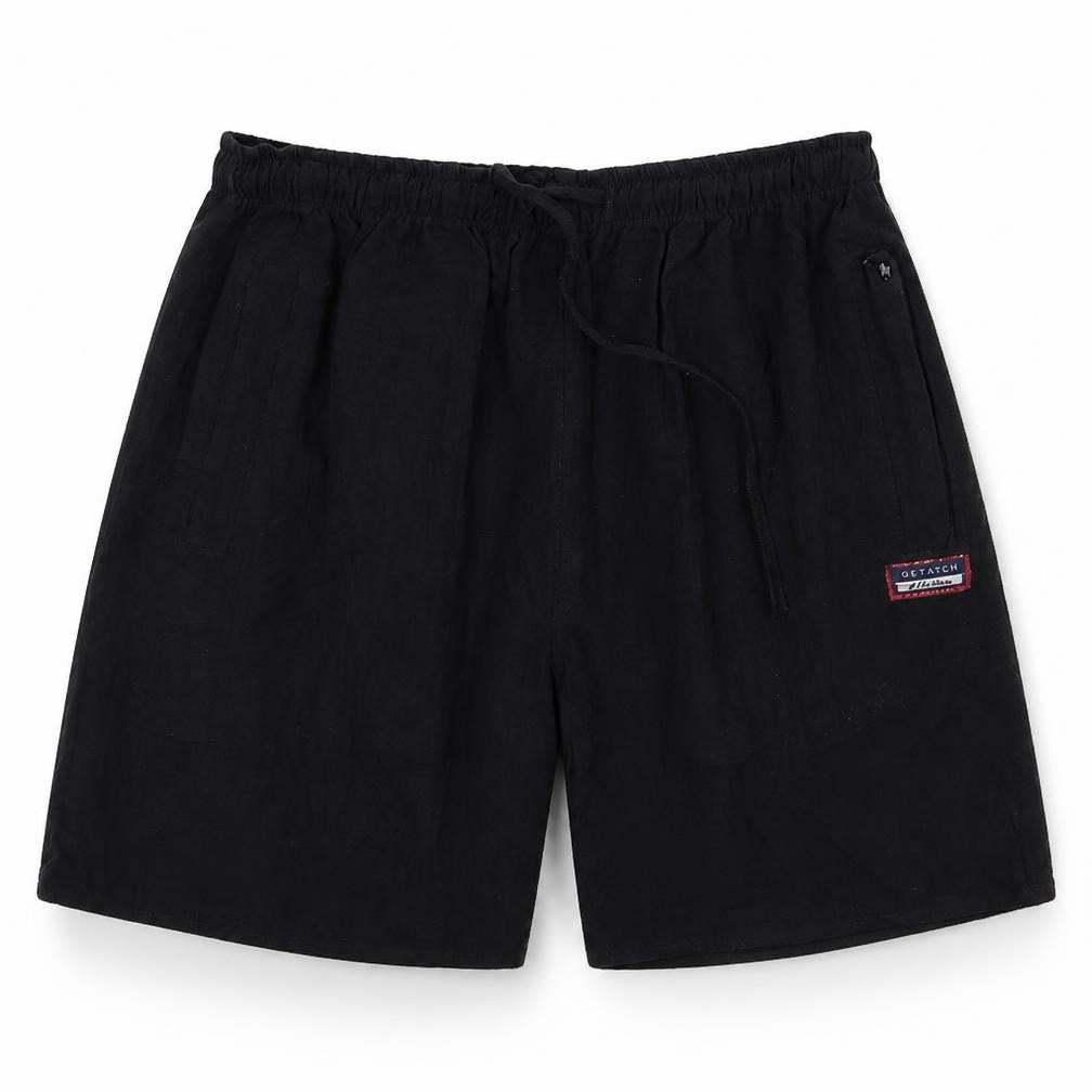 Front view of Get Rich women’s black polyester sweat shorts, size M, 9-inch leg regular drawstring