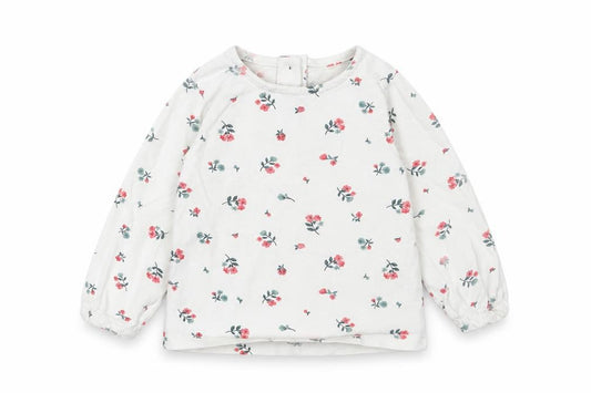 Front view of Dunnes girls’ white floral cotton basic t-shirt, size 6-9, months round neck button