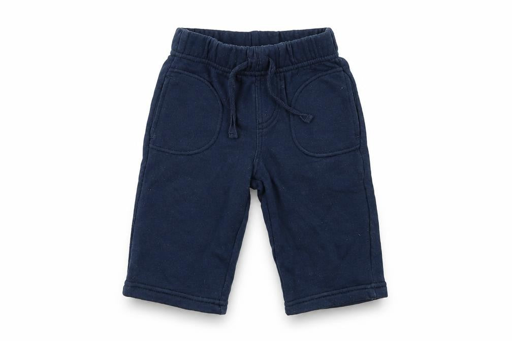 Front view of BHS boys’ blue cotton jogger trousers, size 3-6, months drawstring