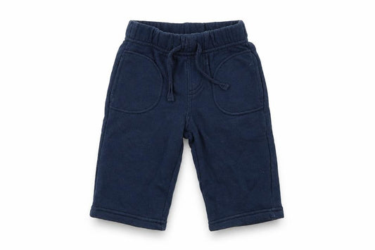 Front view of BHS boys’ blue cotton jogger trousers, size 3-6, months drawstring