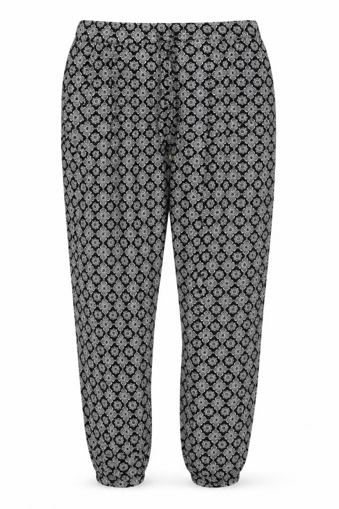Front view of BAF women’s multicoloured geometric viscose trousers, size UK 10, 27-inch leg regular