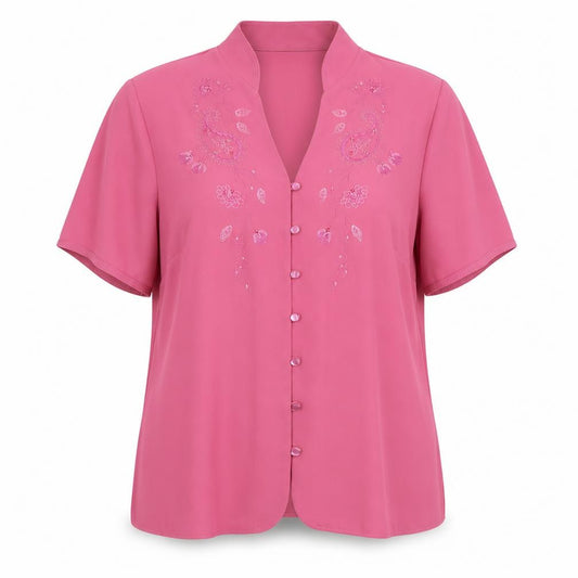 Front view of Marks & Spencer women’s pink floral polyester basic button-up, size UK 14, v-neck