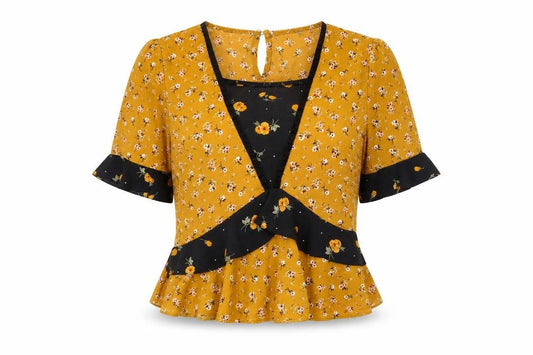 Front view of Primark women’s yellow floral polyester basic blouse, size UK 10, round neck