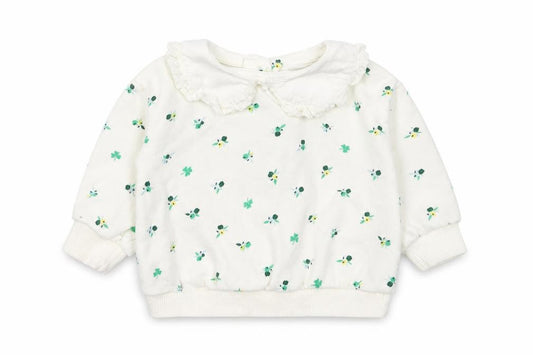 Front view of Leigh Tucker girls’ white floral cotton jumper, size 3-6, months snap