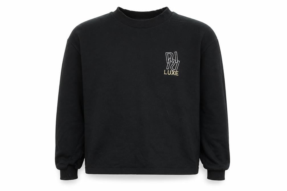 Front view of River Island girls’ black polyester pullover sweatshirt, size 9-10, years