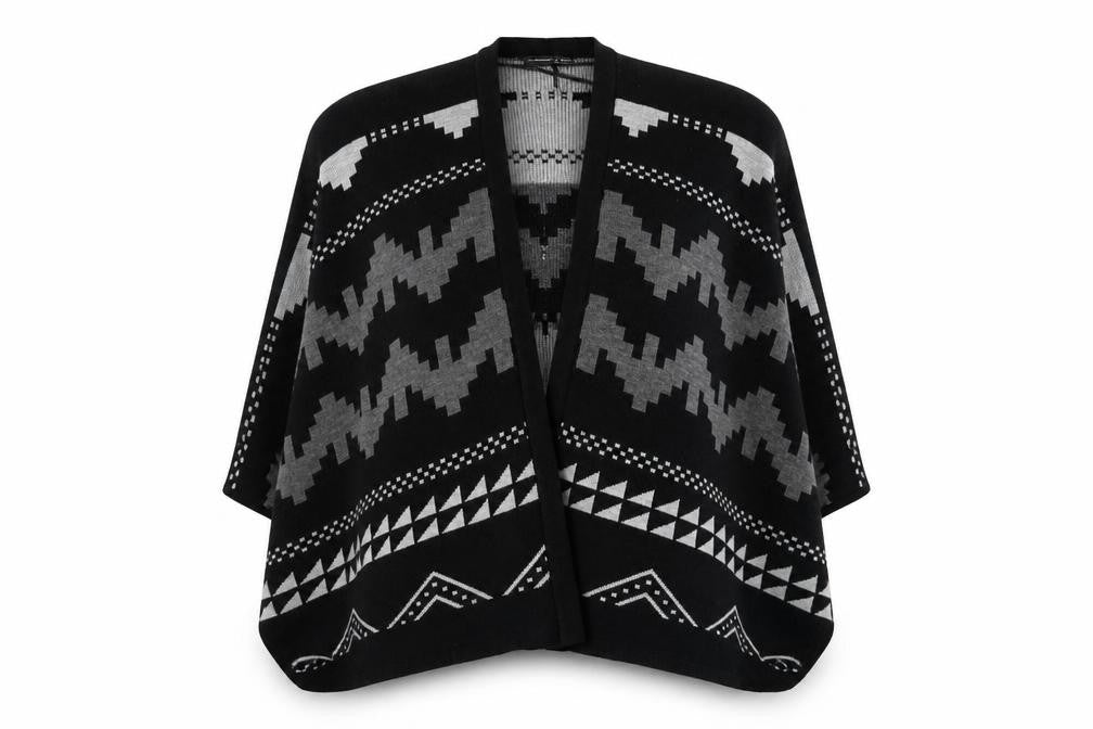Front view of Atmosphere women’s black v-neck geometric acrylic cape jumper, size M