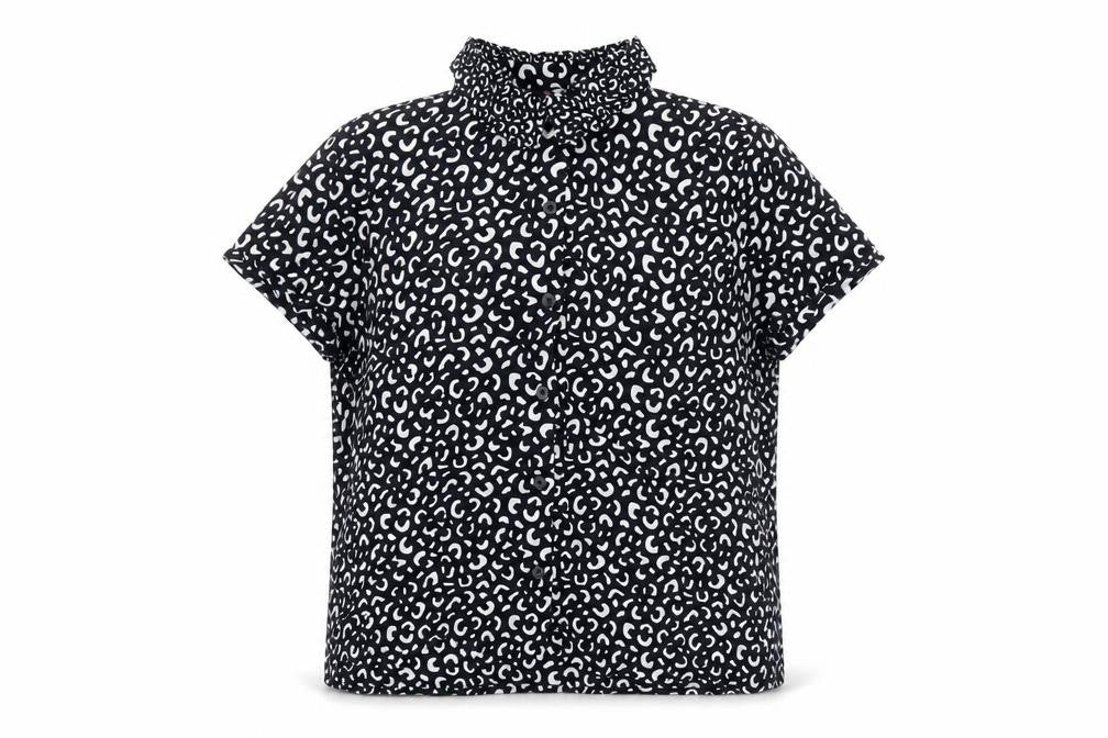 Front view of Divided by H&M women’s black geometric modal basic button-up, size UK 6, collared