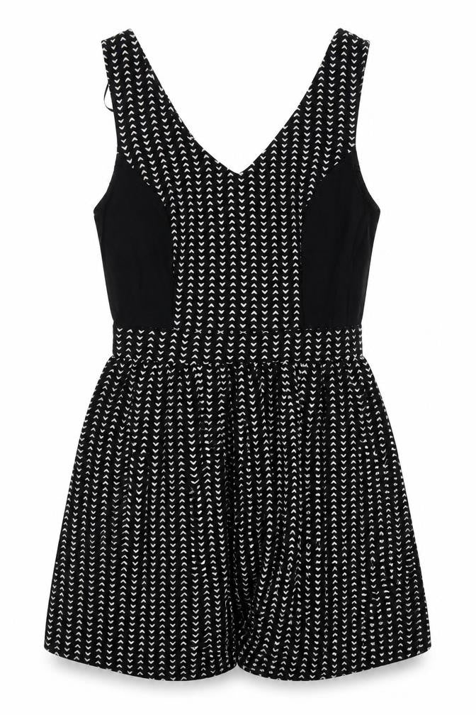 Front view of H&M women’s black geometric polyester fit & flare, size UK 8, v-neck zip