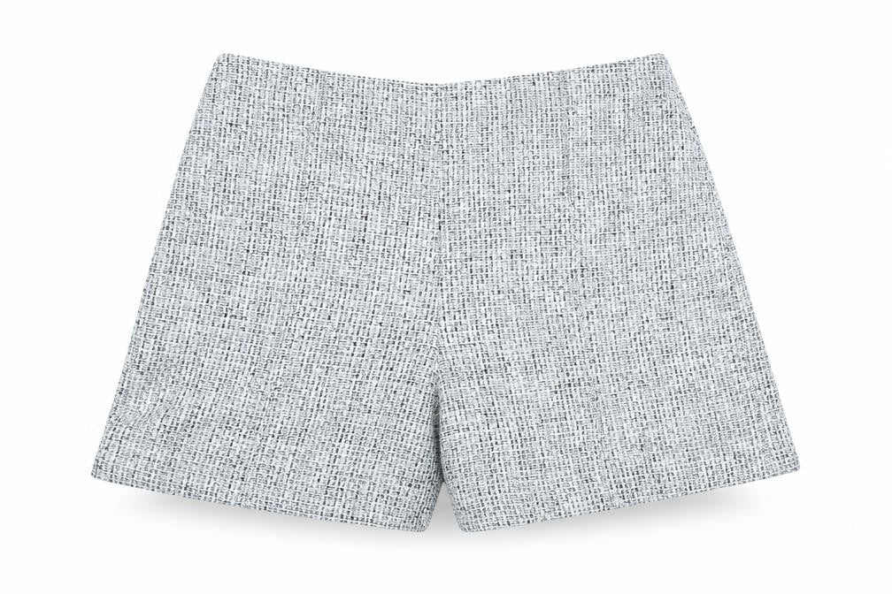 Front view of Marks & Spencer women’s blue houndstooth polyester cut-off shorts, size UK 20, regular zip