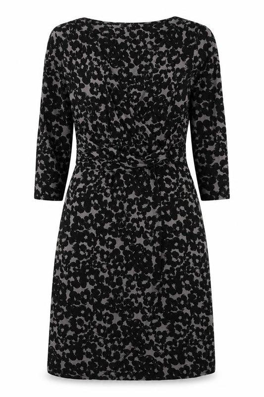 Front view of Monsoon women’s black floral viscose wrap dress, size UK 10, v-neck tie