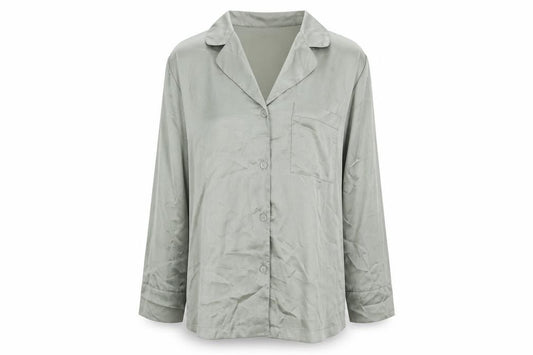 Front view of H&M women’s green polyester basic button-up, size M, high neck