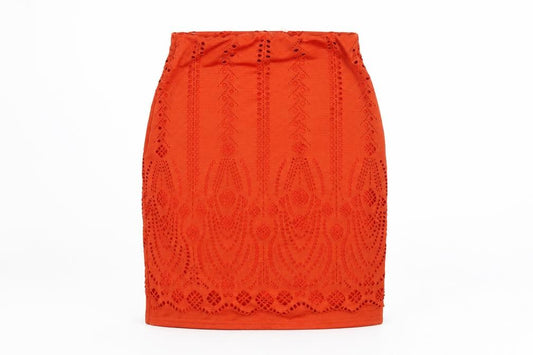 Front view of Missguided women’s orange polyester mini skirt, size UK 4